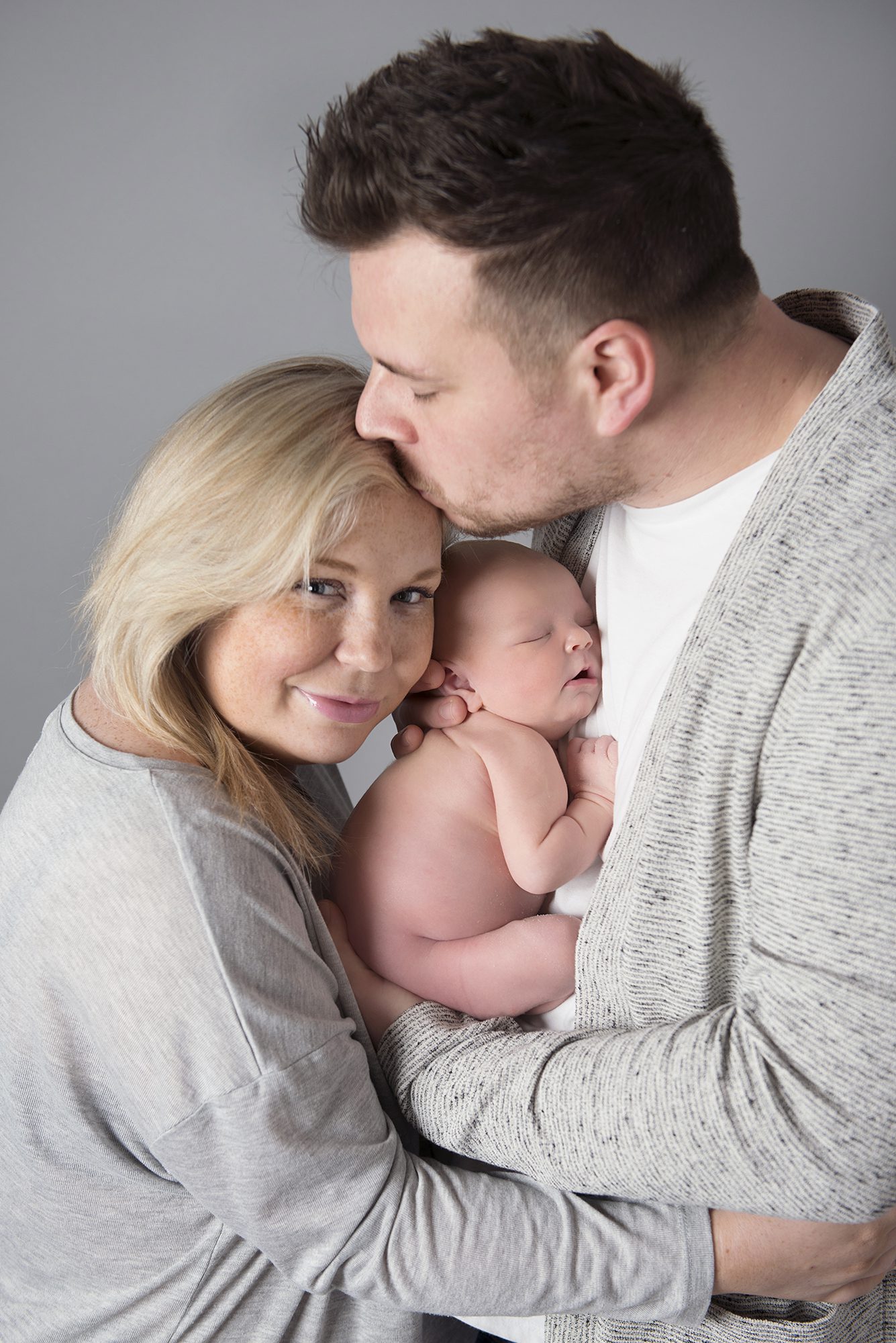 family photoshoot with newborn baby by photographer Berkshire