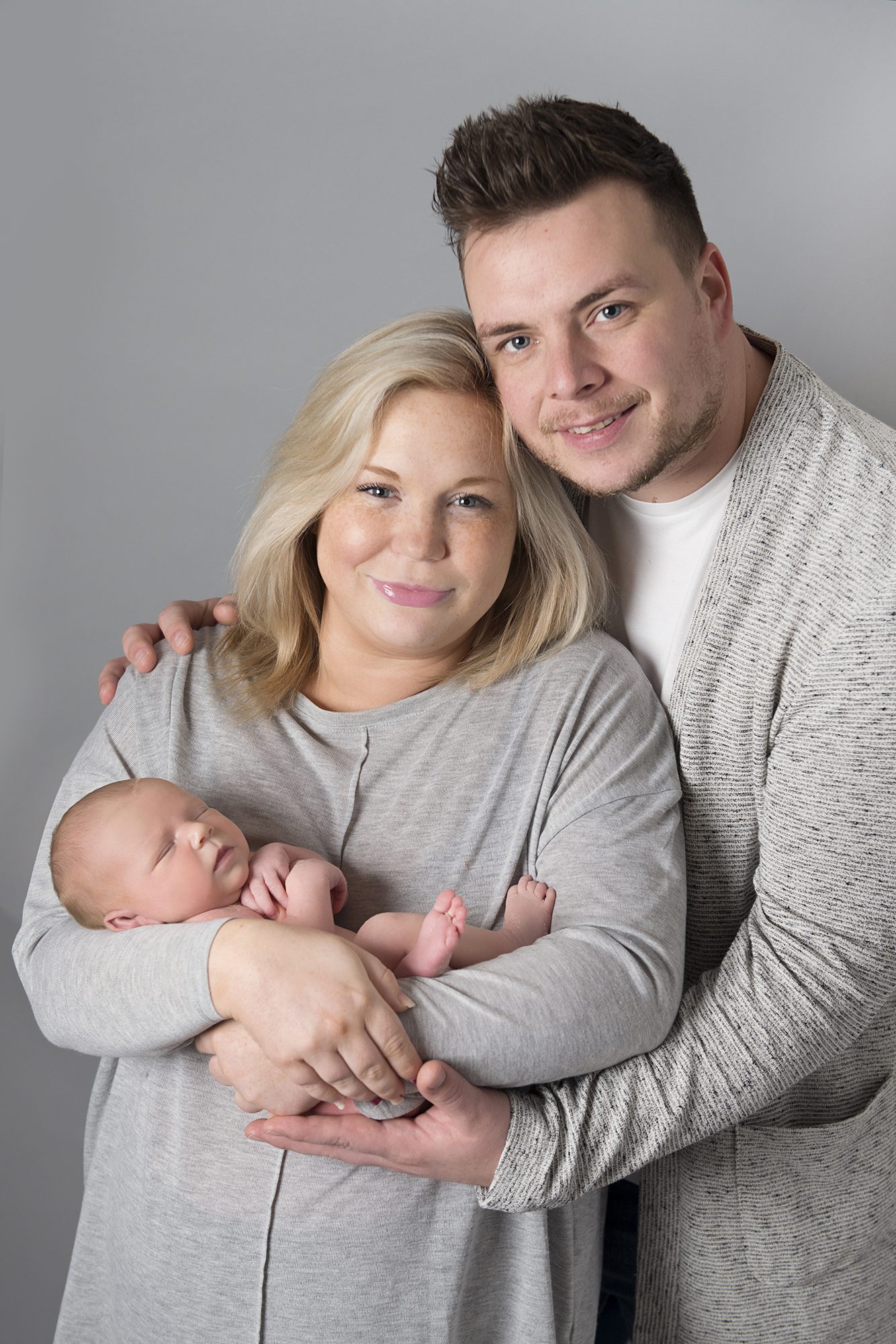 family and newborn baby picture by photographer Wokingham