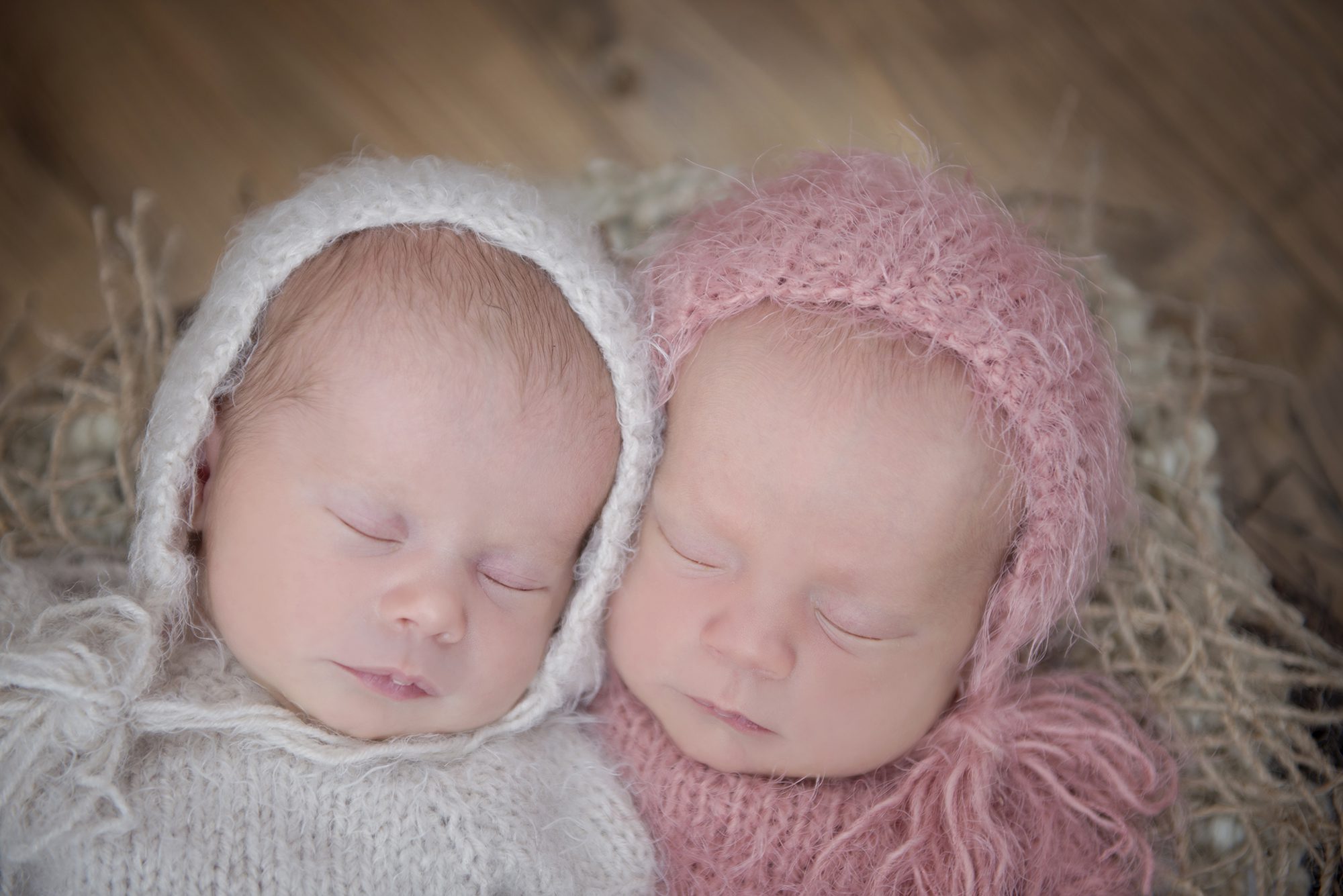 close up photo of baby twin sisters by newborn photographer Maidenhead