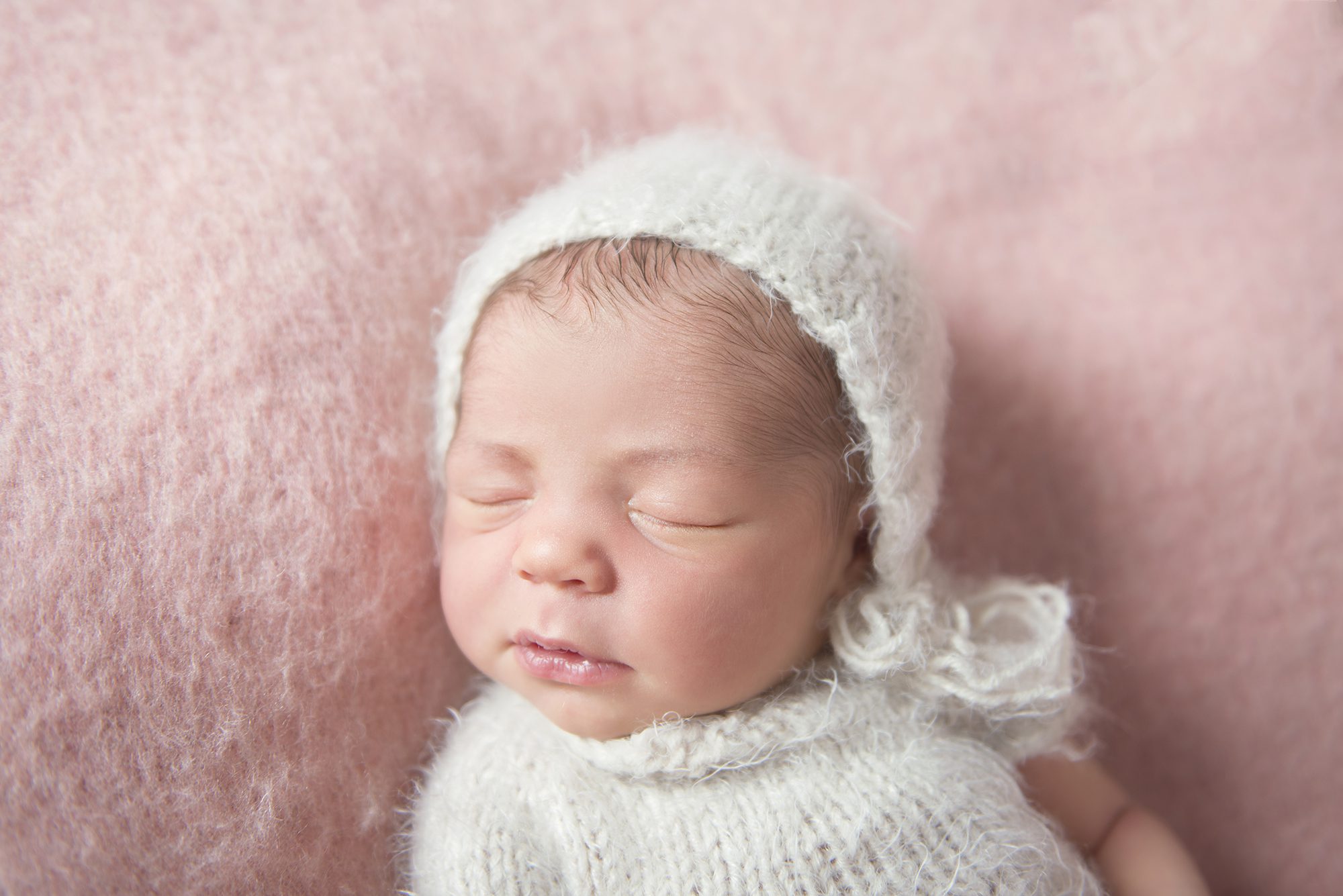 close up photo of baby taken by newborn photographer Twyford