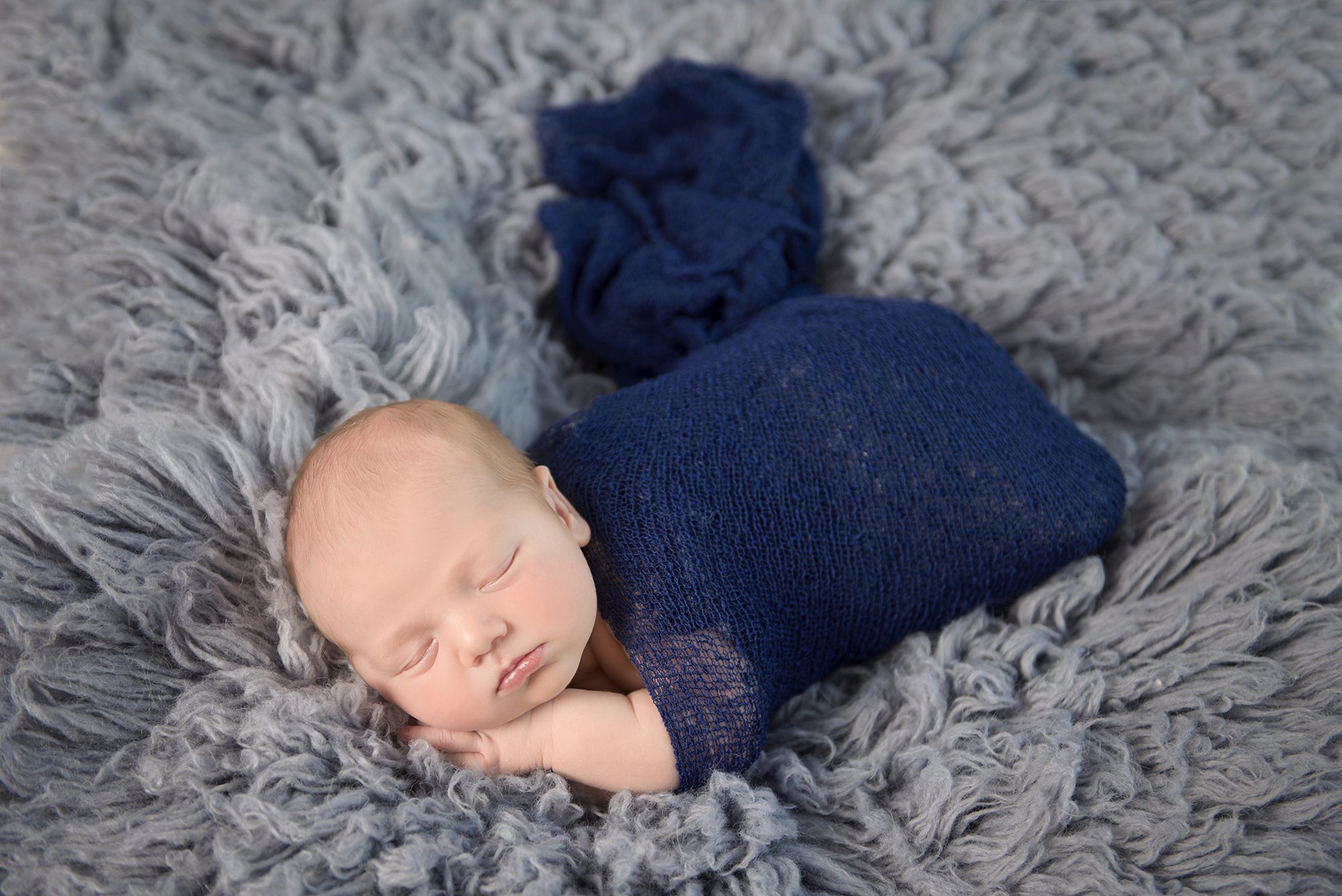 baby in blue by newborn photographer Twyford, Wokingham