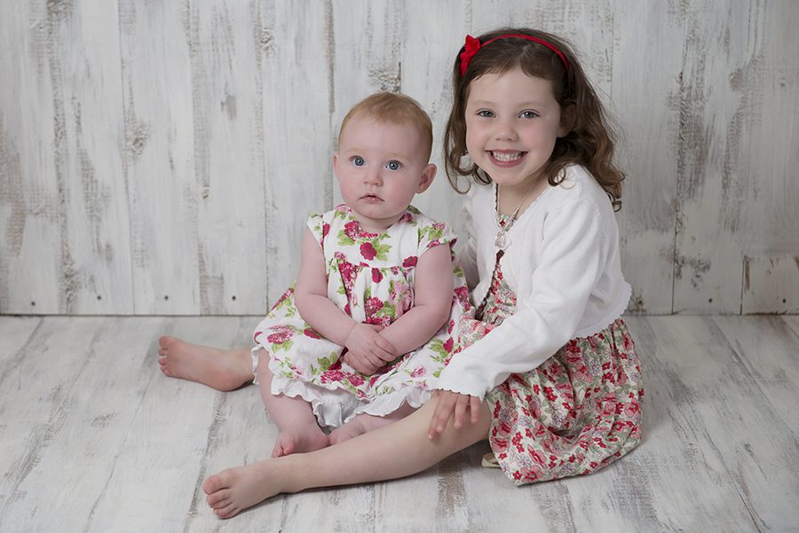 siblings having photo taken for family photography session Henley on Thames